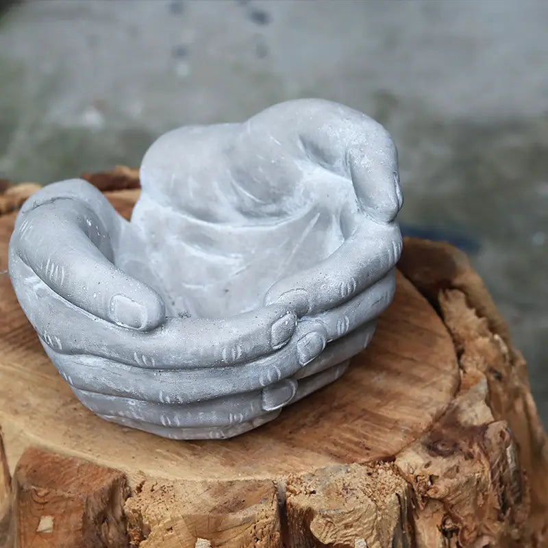 Hand-Shaped Concrete Planters